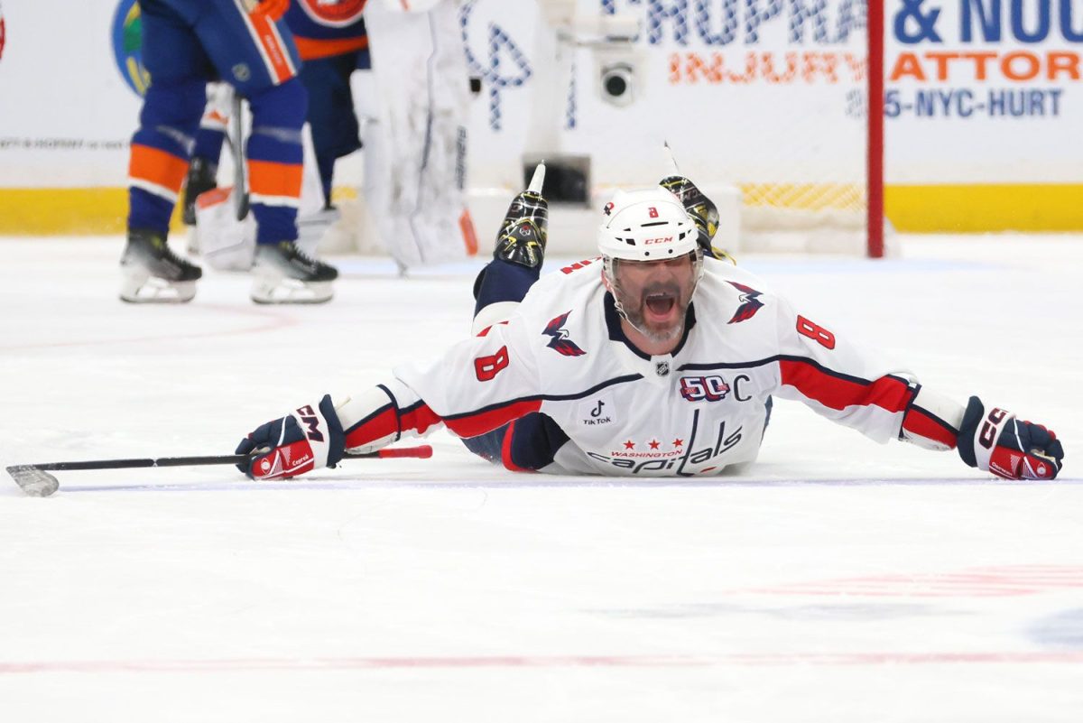 Alex Ovechkin celebrates his 895th career goal
