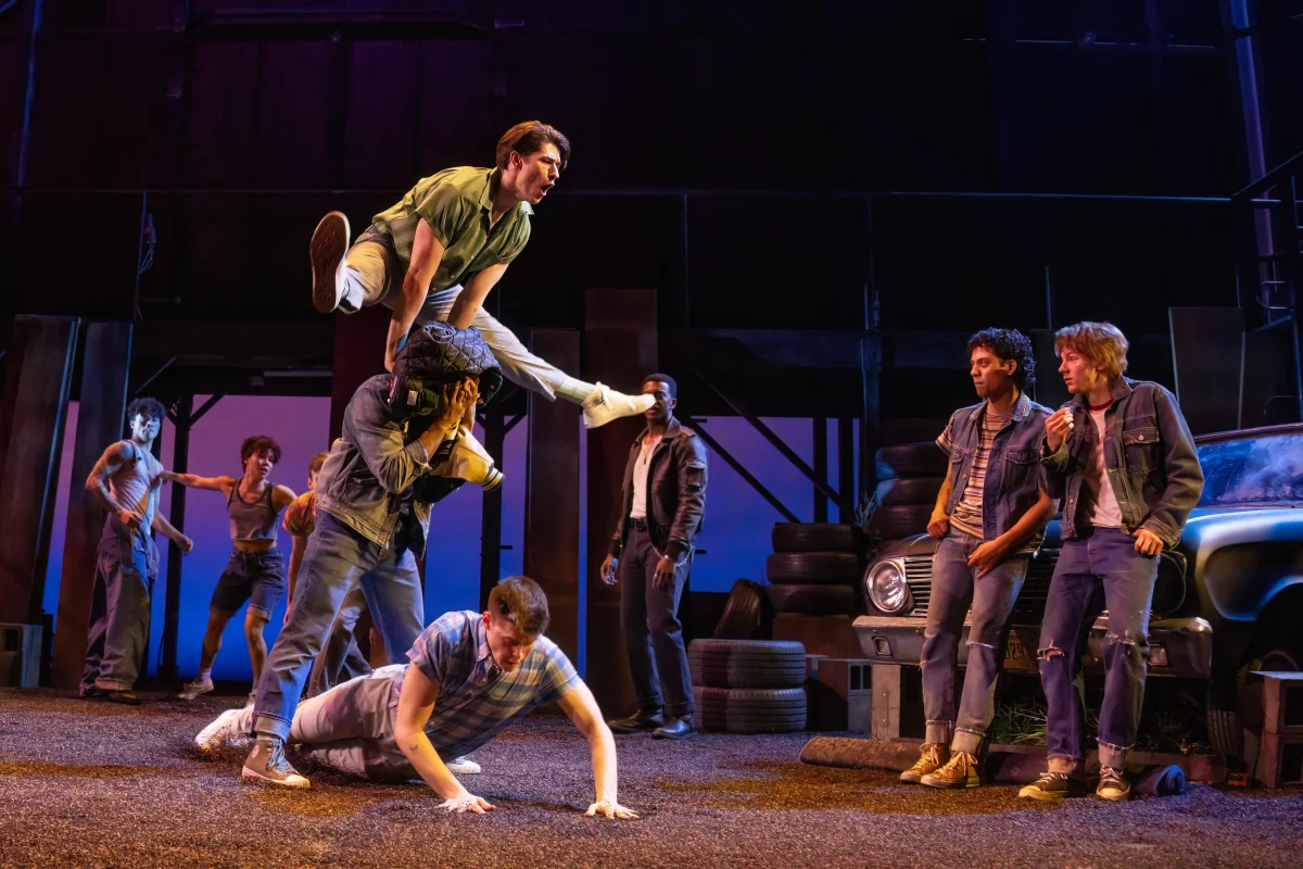 The Tony-Award-winning musical "The Outsiders" (2023) uses innovative lighting and sound design to transform S.E. Hinton's original text into an immersive viewing experience. Photo by Matthew Murphy