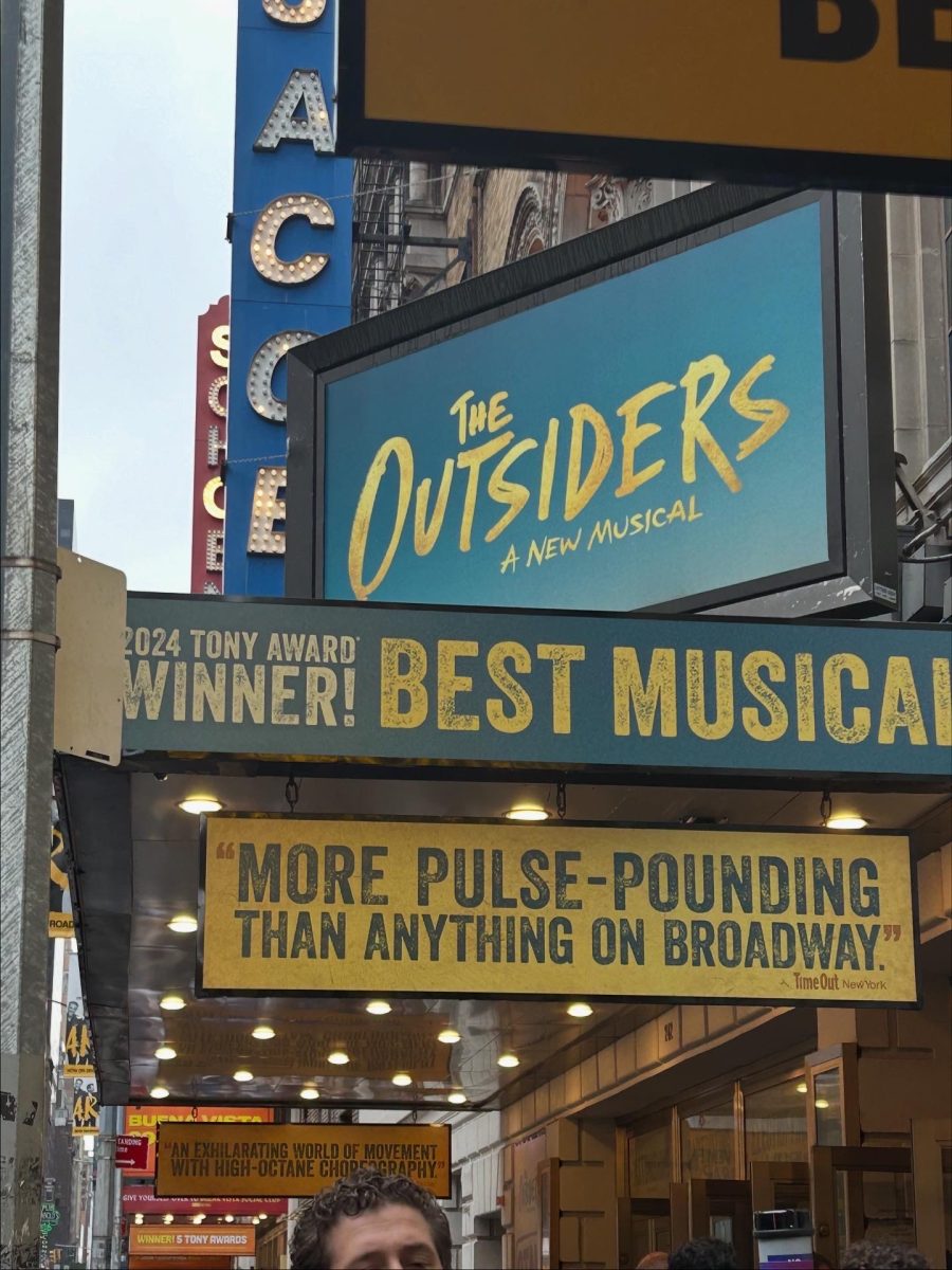 A view of the marquee for 'The Outsiders' at the Bernard B. Jacobs Theater, where students had the opportunity see a Broadway show