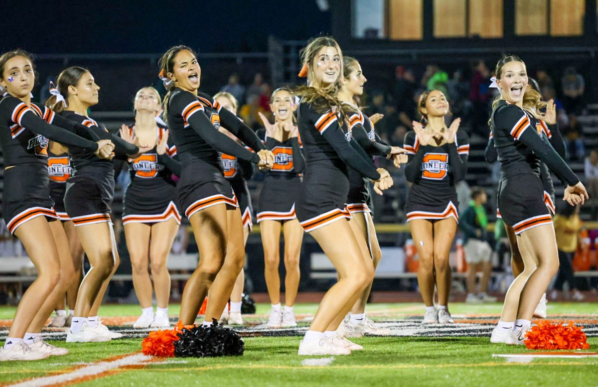 Ville Cheer in action. The cheerleaders put on their hit-filled routine for each home game.