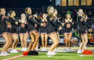 Ville Cheer in action. The cheerleaders put on their hit-filled routine for each home game.