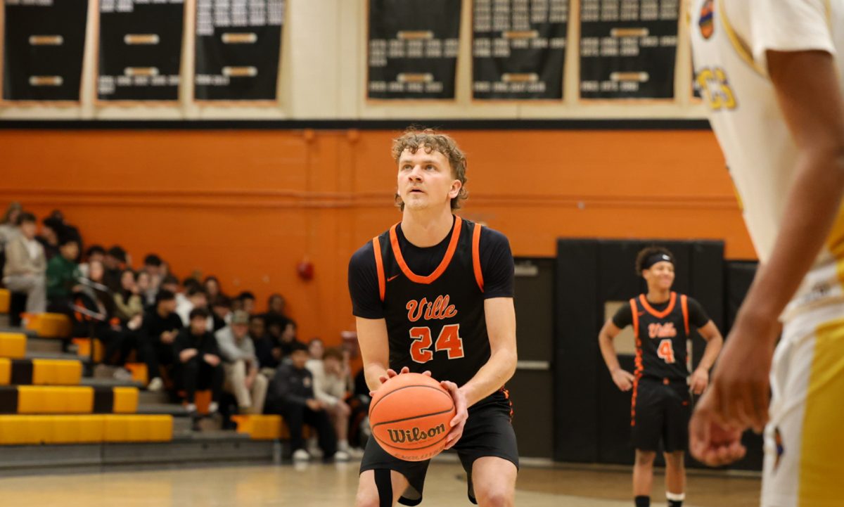 Senior Timmy LaCanna, '26 lines up for a free throw. Photo courtesy of @epsmith_photography26