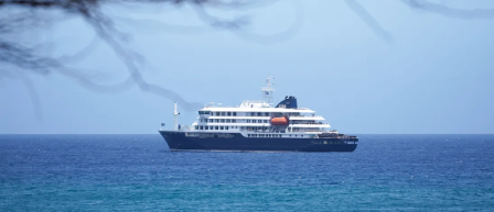 The MV Hondius cruise ship is anchored at a port in Praia, Cape Verde, waiting for word on where to dock. (AP Photo/Arilson Almeida)
