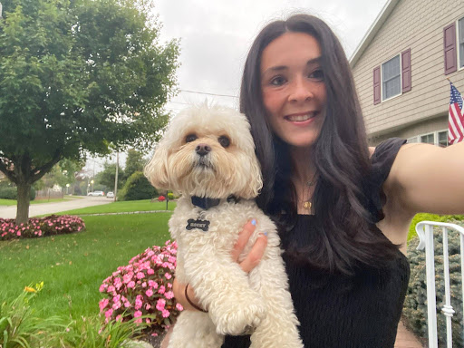 Ms. Macaluso with her puppy.